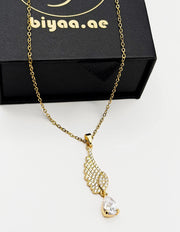 Waterproof non-tarnish artificial gold jewelry resting in a luxury presentation box.