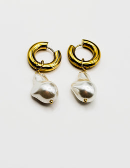 Biya Accessoires 18K gold plated baroque pearl drop hoop earrings.