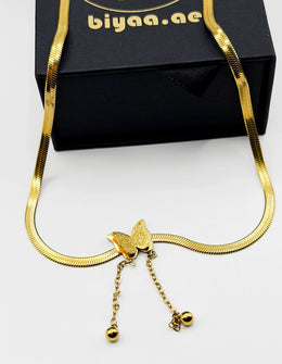 Biya Accessoires 18K gold plated butterfly snake chain lariat necklace.