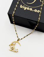 Waterproof non-tarnish artificial gold jewelry with moon and star pendant in Dubai.