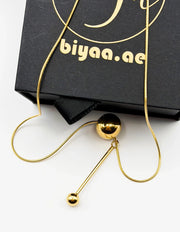 Close-up of premium hypoallergenic imitation jewelry featuring a sliding sphere design.