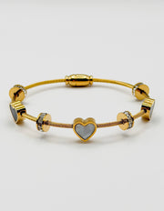 Non-tarnish luxury gold and black enamel heart bracelet for women.