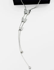 Waterproof non-tarnish silver butterfly Y-necklace resting in a luxury gift box.