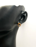 Multi-pair gold earring set for everyday luxury fashion in the UAE.
