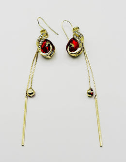 Biya Accessoires artificial jewellery online dubai Ruby Red peacock crystal tassel earrings.