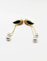 مجوهرات دبي gold plated green and white enamel pearl fringe earrings.