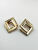 Biya Accessoires artificial jewellery online dubai interlocking geometric gold hoop earrings.