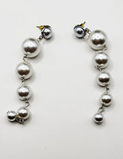 Best imitation jewellery brands in uae shoulder grazing pearl earrings.