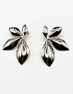 Best imitation jewellery brands in uae polished silver botanical leaf earrings.