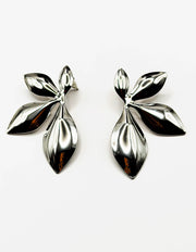 Best imitation jewellery brands in uae polished silver botanical leaf earrings.