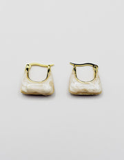 Biya Accessoires artificial jewellery online dubai white marble geometric hoops.