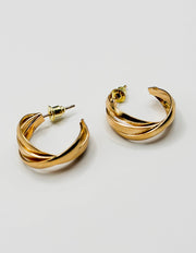Biya Accessoires gold multi strand twisted hoop earrings.