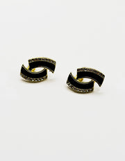 Biya Accessoires gold black enamel and crystal interlocking stud earrings.