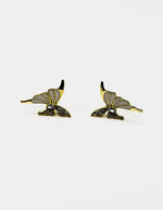 Biya Accessoires gold butterfly stud earrings with black enamel and crystals.