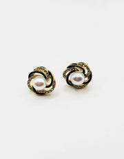 Best fashion jewelry in UAE ivory black and gold swirl pearl earrings for women.