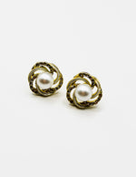 Everyday luxury fashion jewelry gold tone statement studs by Biya Accessoires Dubai.