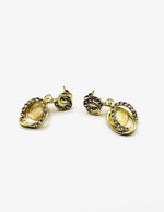 Biya Accessoires gold cat's eye and crystal interlocking drop earrings.