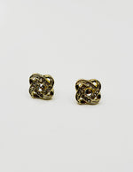Biya Accessoires gold crystal love knot stud earrings.