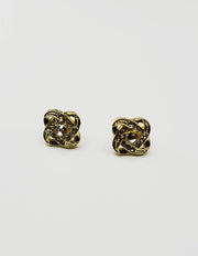 Biya Accessoires gold crystal love knot stud earrings.