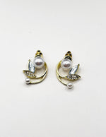 Close-up of premium hypoallergenic imitation jewelry featuring a botanical pearl design.