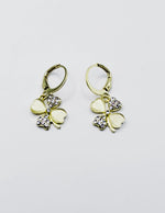 Best fashion jewelry in UAE opal effect and crystal clover earrings.