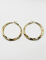 Elegant minimalist large statement earrings for women.