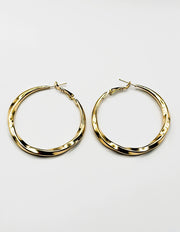 Elegant minimalist large statement earrings for women.