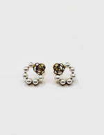 Biya Accessoires gold rose and pearl halo stud earrings.