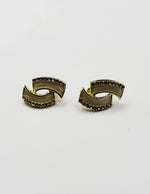 Close-up of premium hypoallergenic imitation jewelry featuring a geometric crystal design.