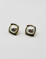 Biya Accessoires iridescent moonstone stud earrings with crystal pavé.