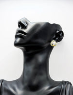 Best fashion jewelry in UAE silver teardrop pearl statement studs for women.