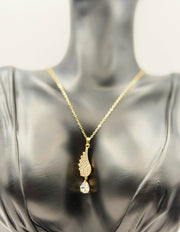 Biya Accessoires 18K gold plated angel wing necklace with pave crystals and teardrop stone.