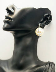 Best fashion jewelry in UAE silver pearl statement hoops for women.