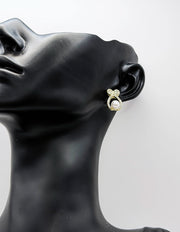 Close-up of premium hypoallergenic imitation jewelry featuring a large white pearl.