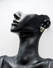 Close-up of premium hypoallergenic imitation jewelry featuring a layered pearl design.