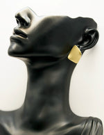 Close-up of premium hypoallergenic imitation jewelry featuring a matte gold finish.