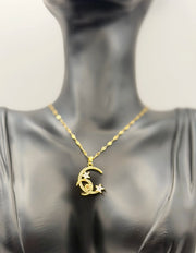 Biya Accessoires 18K gold plated crescent moon and stars pavé necklace.