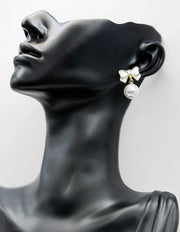 Everyday luxury jewelry uae coquette earrings by the best jewelry shop in UAE.