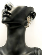 Best imitation jewellery brands in uae silver ear cuffs with clear rhinestones and teardrop dangles.