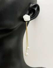 Best imitation jewellery brands in uae gold rose studs with hanging pearl chains.