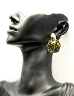 Biya Accessoires artificial jewellery online dubai gilded gold shell statement studs.
