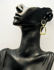 Elegant black and gold pavé crystal statement earrings for women.