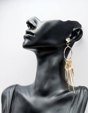 Everyday luxury fashion jewelry gold tone cascading drops by Biya Accessoires Dubai.