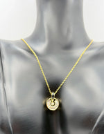 Hypoallergenic gold medallion necklace with AAA cubic zirconia stones.