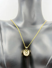 Hypoallergenic gold medallion necklace with AAA cubic zirconia stones.