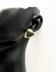 Everyday luxury fashion jewelry gold tone geometric studs by Biya Accessoires Dubai.