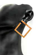 Everyday luxury fashion jewelry gold tone statement hoops by Biya Accessoires Dubai.