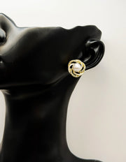 Best fashion jewelry in UAE ivory white and gold swirl pearl earrings for women.