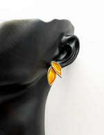 Close-up of premium hypoallergenic imitation jewelry featuring organic leaf design.