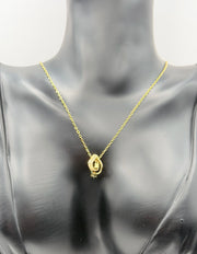 Gold eternity pendant necklace with cubic zirconia stones by Biya Accessoires.